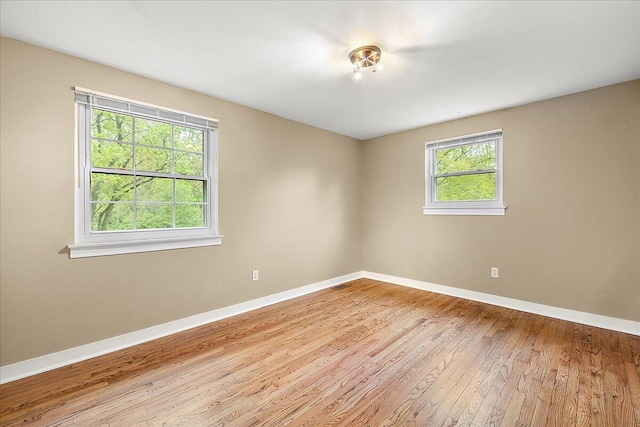 50951 Murray Hill Dr, Canton, MI 48187 - unfurnished room featuring light wood finished floors and baseboards