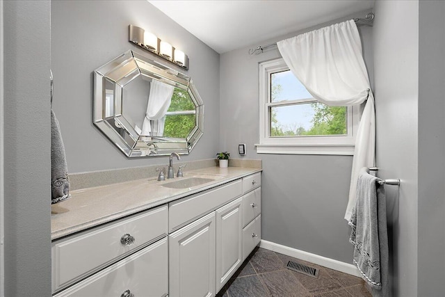 50951 Murray Hill Dr, Canton, MI 48187 - bathroom with vanity, baseboards, and tile patterned floors