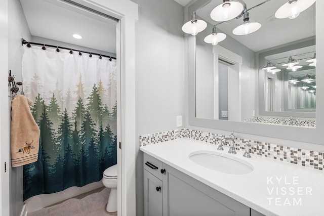 11650 Lally St NE, Lowell, MI 49331 - full bath with toilet, vanity, and a shower with curtain