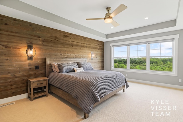 11650 Lally St NE, Lowell, MI 49331 - bedroom featuring wood walls, light colored carpet, baseboards, recessed lighting, and ceiling fan