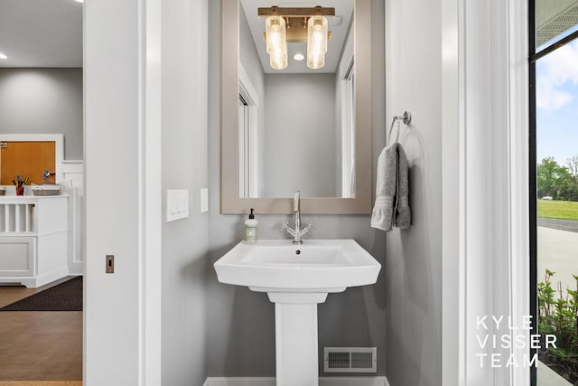 11650 Lally St NE, Lowell, MI 49331 - bathroom featuring healthy amount of natural light