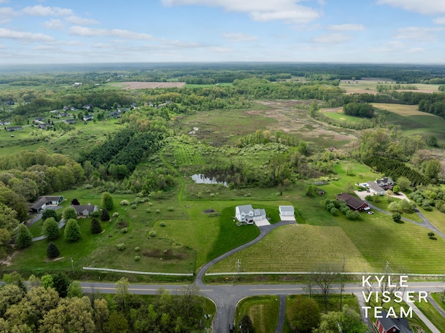 11650 Lally St NE, Lowell, MI 49331 - aerial overview of property's location with rural landscape
