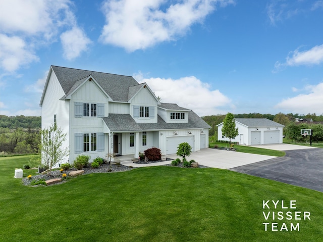 11650 Lally St NE, Lowell, MI 49331 - modern inspired farmhouse featuring board and batten siding, roof with shingles, a front yard, and concrete driveway