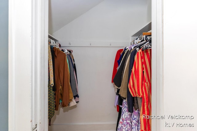 spacious closet featuring vaulted ceiling