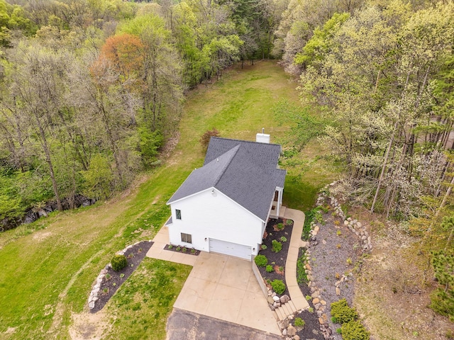 12700 Mcpherson St NE, Lowell, MI 49331 - aerial view of property and surrounding area with a heavily wooded area