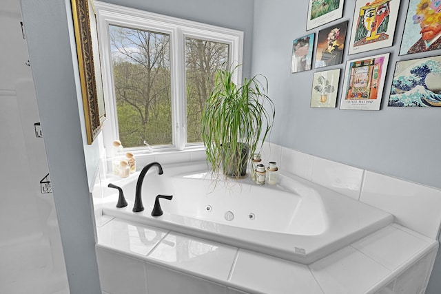 12700 Mcpherson St NE, Lowell, MI 49331 - bathroom featuring a tub with jets