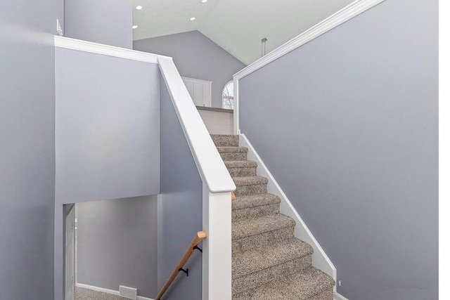 12700 Mcpherson St NE, Lowell, MI 49331 - staircase with lofted ceiling, recessed lighting, and baseboards