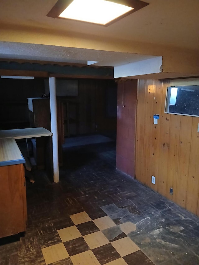 317 Country Club Ter, Battle Creek, MI 49015 - finished basement featuring wood walls and dark floors