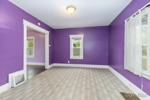 412 Breens Ct SW, Grand Rapids, MI 49503 - carpeted empty room with plenty of natural light and baseboards