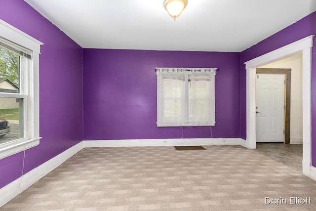 412 Breens Ct SW, Grand Rapids, MI 49503 - carpeted empty room featuring baseboards