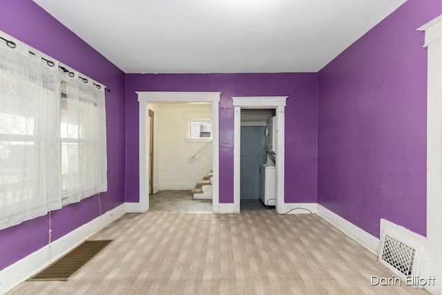412 Breens Ct SW, Grand Rapids, MI 49503 - unfurnished bedroom featuring baseboards, carpet, and a closet