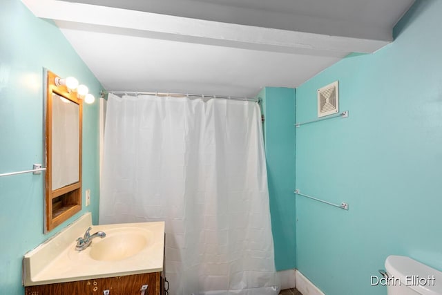 412 Breens Ct SW, Grand Rapids, MI 49503 - full bath with toilet, vanity, and a shower with curtain