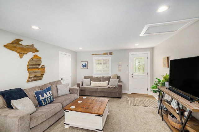 3957 Cleveland Dr W, Bitely, MI 49309 - carpeted living room with recessed lighting, attic access, and baseboards