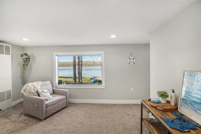3957 Cleveland Dr W, Bitely, MI 49309 - living area featuring a heating unit, carpet flooring, recessed lighting, and baseboards