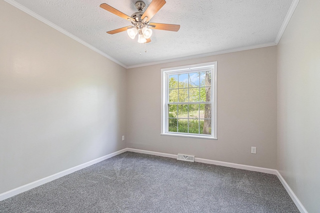 unfurnished room featuring a textured ceiling, dark colored carpet, ceiling fan, baseboards, and ornamental molding