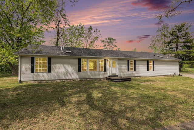 single story home with a front yard