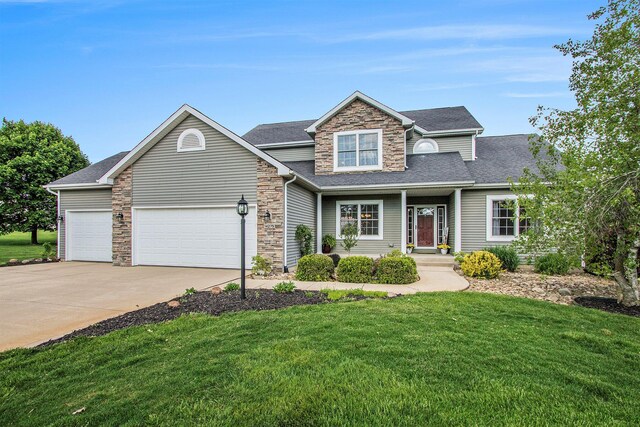 14275 Sunset Ridge Ct, Niles, MI 49120 - view of front of home featuring stone siding, driveway, a front lawn, an attached garage, and roof with shingles