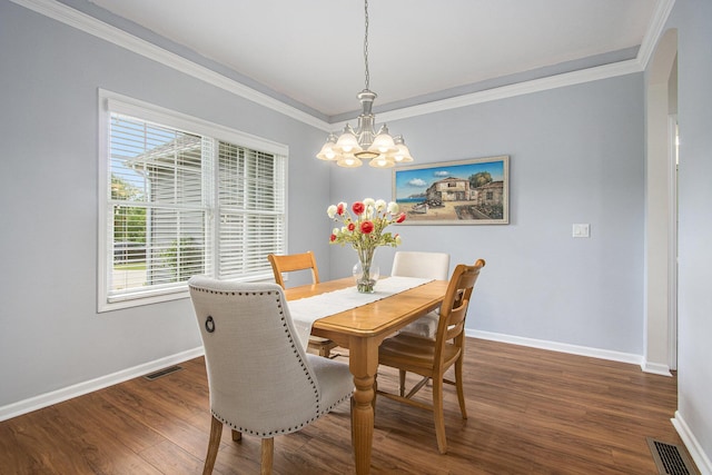 14275 Sunset Ridge Ct, Niles, MI 49120 - dining space featuring a chandelier, baseboards, crown molding, and wood finished floors