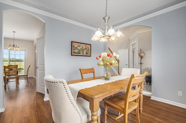 14275 Sunset Ridge Ct, Niles, MI 49120 - dining space with arched walkways, a chandelier, baseboards, wood finished floors, and crown molding