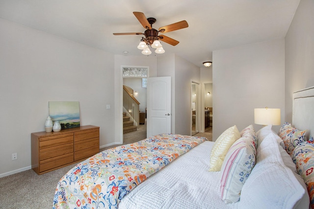 14275 Sunset Ridge Ct, Niles, MI 49120 - carpeted bedroom featuring baseboards, ceiling fan, and ensuite bathroom
