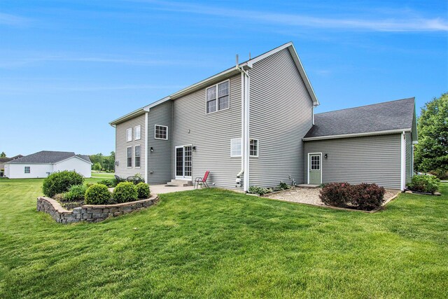 14275 Sunset Ridge Ct, Niles, MI 49120 - back of house featuring a lawn and a patio area