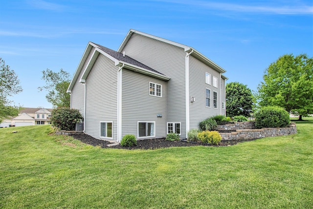 14275 Sunset Ridge Ct, Niles, MI 49120 - view of side of home featuring a lawn