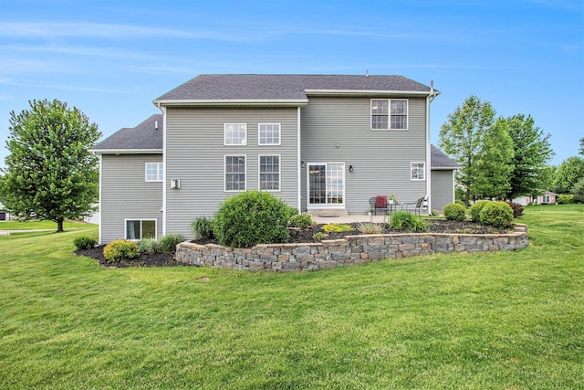14275 Sunset Ridge Ct, Niles, MI 49120 - rear view of house featuring a lawn, a patio area, and a shingled roof