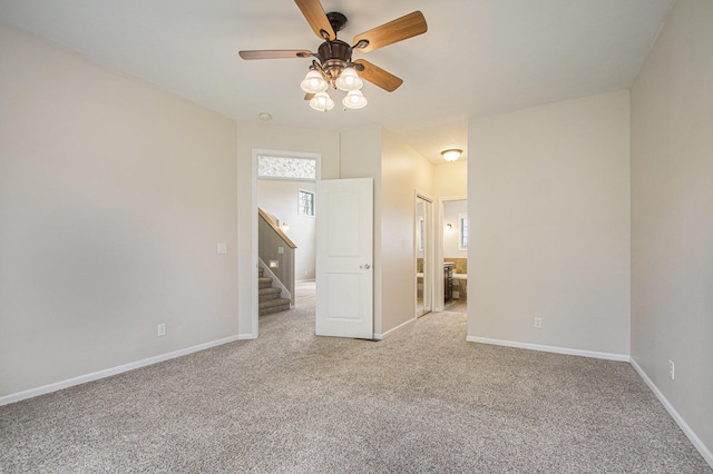 14275 Sunset Ridge Ct, Niles, MI 49120 - unfurnished room with a ceiling fan, light colored carpet, baseboards, and stairs