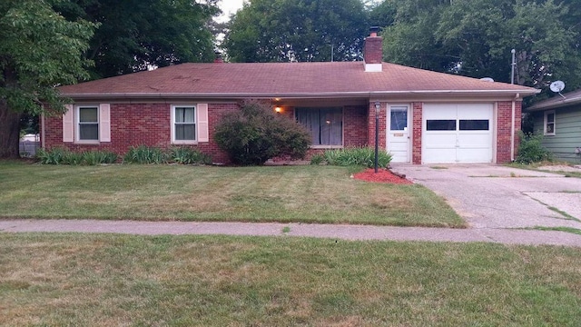 single story home with an attached garage, brick siding, a chimney, and concrete driveway