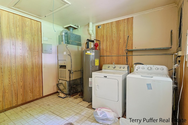 3904 Canterbury Ave, Kalamazoo, MI 49006 - laundry area featuring electric water heater, washing machine and dryer, attic access, brick patterned flooring, and heating unit