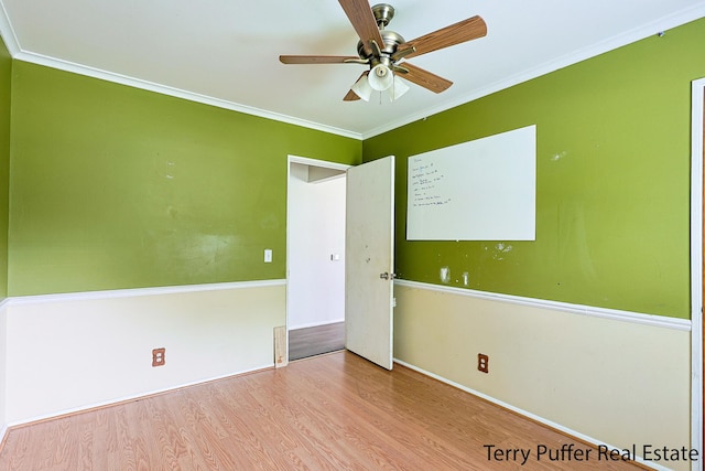 3904 Canterbury Ave, Kalamazoo, MI 49006 - spare room with wood finished floors, ceiling fan, ornamental molding, and baseboards