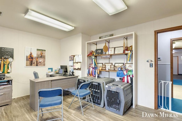 7795 Douglas Ave, Kalamazoo, MI 49009 - home office featuring wood finished floors and a decorative wall