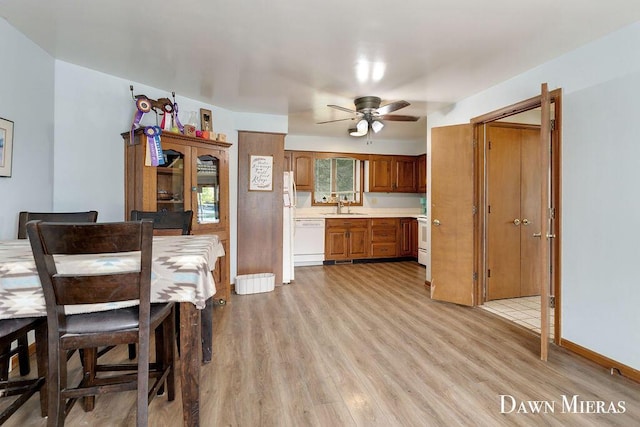 7795 Douglas Ave, Kalamazoo, MI 49009 - dining room featuring ceiling fan and light wood-style floors