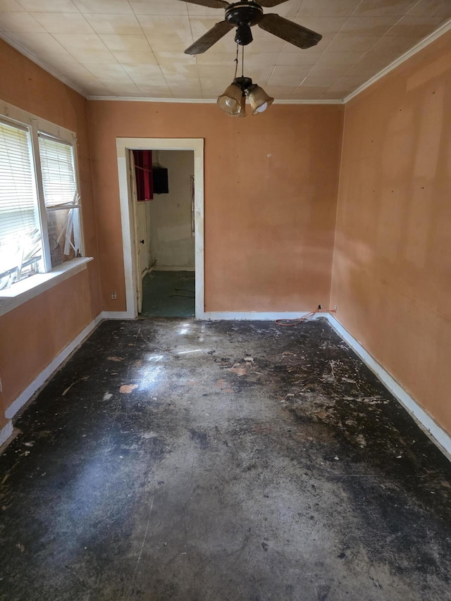 120 2nd St, Ionia, MI 48846 - empty room with ornamental molding, baseboards, and a ceiling fan