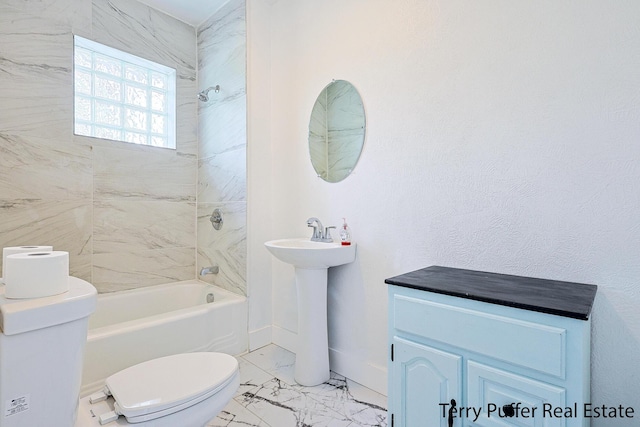 bathroom with marble finish flooring, toilet, shower / bathtub combination, baseboards, and a sink