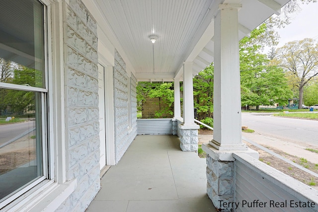 view of patio featuring a porch