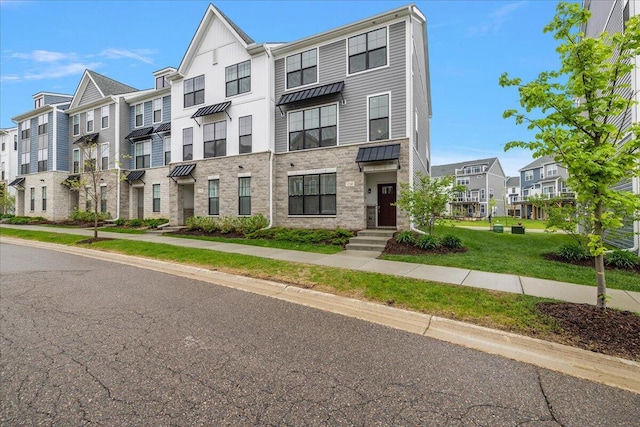 view of property with a residential view