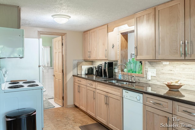 10436 Morgan Mills Ave NE, Greenville, MI 48838 - kitchen with white appliances, a sink, light brown cabinets, and a textured ceiling