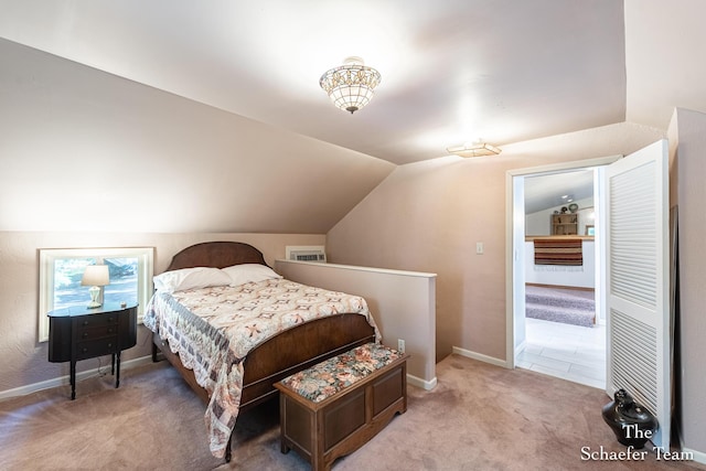 10436 Morgan Mills Ave NE, Greenville, MI 48838 - carpeted bedroom featuring vaulted ceiling and baseboards