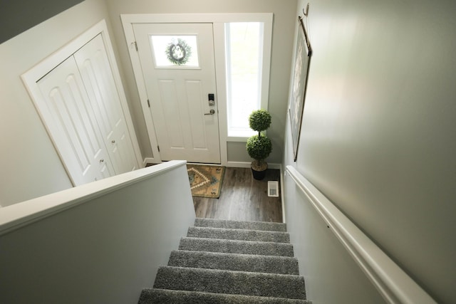 887 Rex St, Fremont, MI 49412 - foyer entrance with wood finished floors and stairs