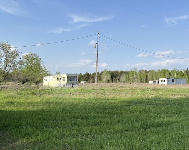 view of yard with a view of rural / pastoral area
