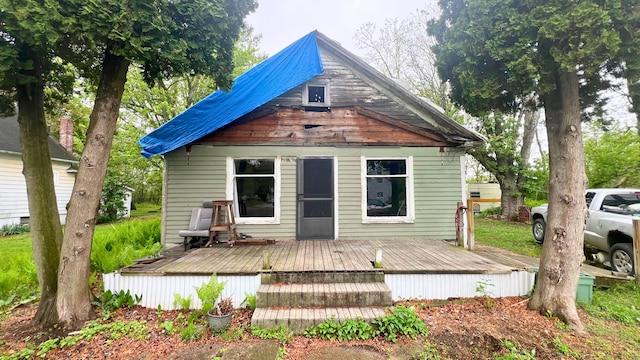 8059 N Wheeler Rd, Wheeler, MI 48662 - back of property with a wooden deck