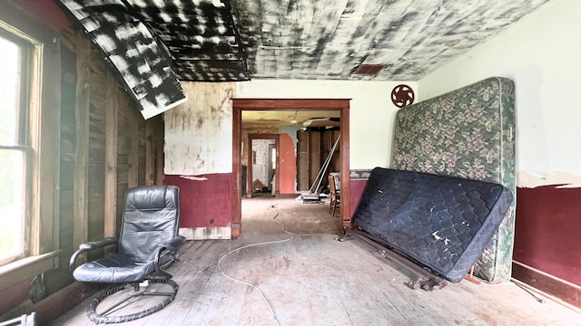 8059 N Wheeler Rd, Wheeler, MI 48662 - miscellaneous room featuring wood-type flooring
