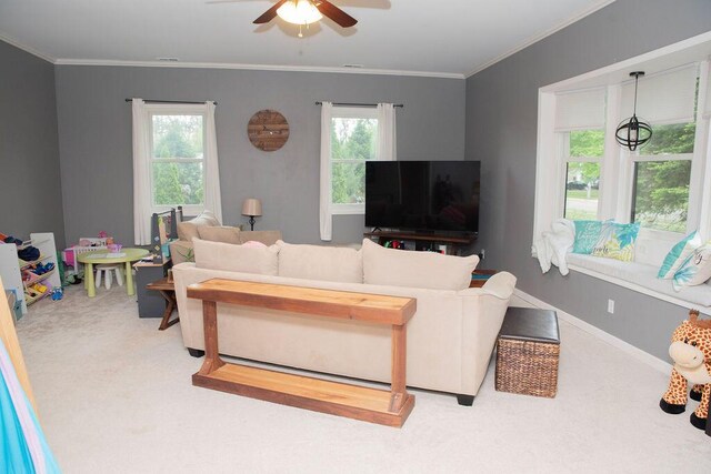19610 Brentwood St, Livonia, MI 48152 - carpeted living area featuring a ceiling fan and crown molding