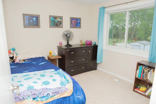 19610 Brentwood St, Livonia, MI 48152 - bedroom featuring light colored carpet and baseboards