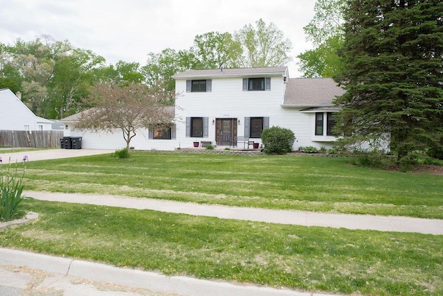 19610 Brentwood St, Livonia, MI 48152 - colonial-style house with concrete driveway and an attached garage