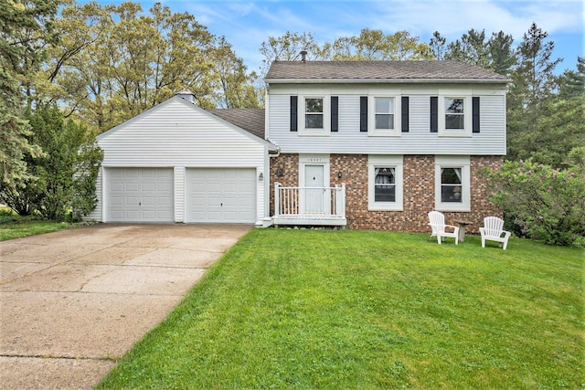 view of front of home featuring an attached garage, brick siding, driveway, and a front lawn