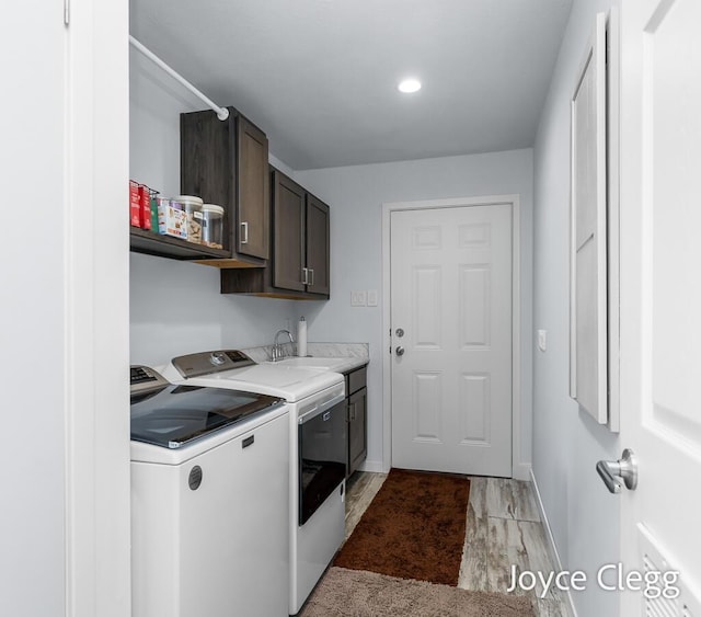 4755 Boulder Dr, Holland, MI 49423 - laundry area with washer and dryer, cabinet space, baseboards, recessed lighting, and light wood-type flooring