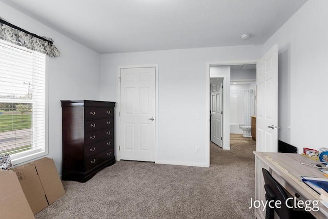 4755 Boulder Dr, Holland, MI 49423 - carpeted bedroom with multiple windows and baseboards