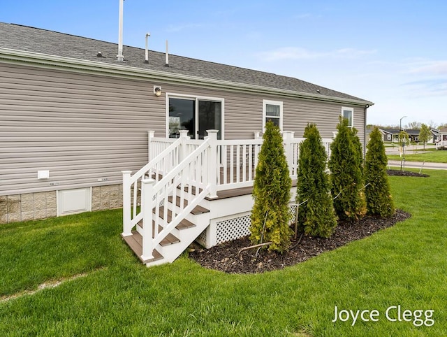 4755 Boulder Dr, Holland, MI 49423 - rear view of property with a lawn